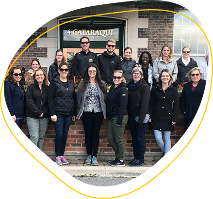 BBD employees standing together, smiling