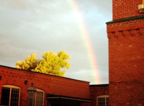 Woolen Mill in Kingston with rainbow over it