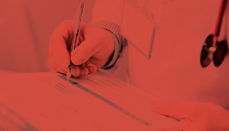 Hand writing on a notepad.