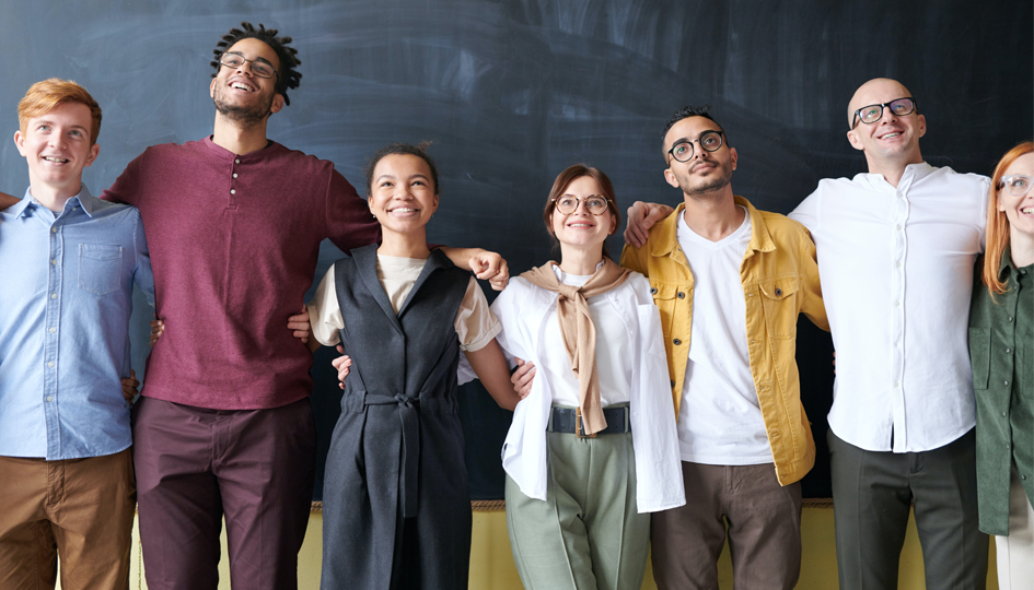 Employees hand-in-hand | Total Compensation | Benefits by Design