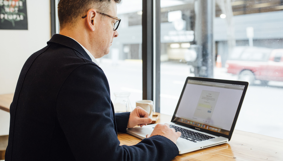 Man using laptop | Proactive Selling | Benefits by Design