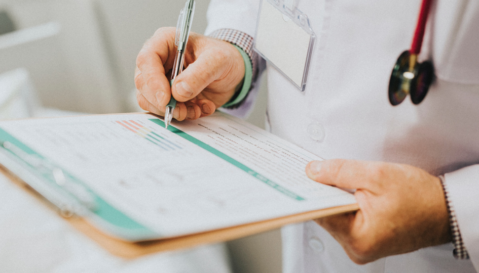 Doctor with a clipbpard | MSO | Benefits by Design