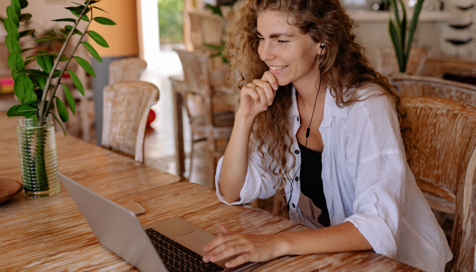 Woman working on a laptop | Professional Development | Benefits by Design