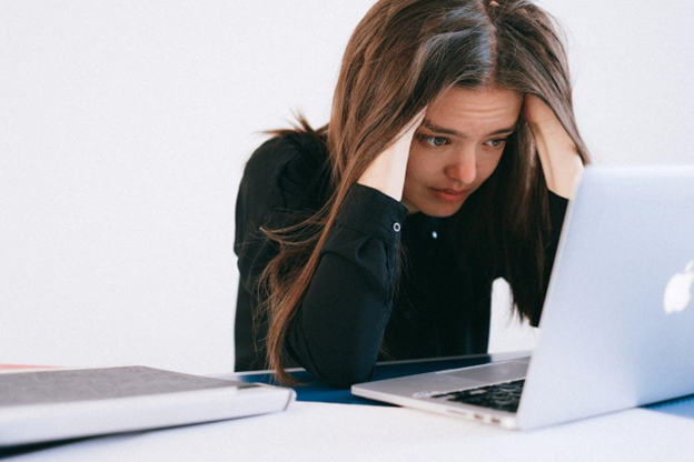 Stressed person at work.
