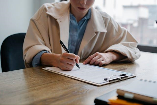 A woman completing a survey