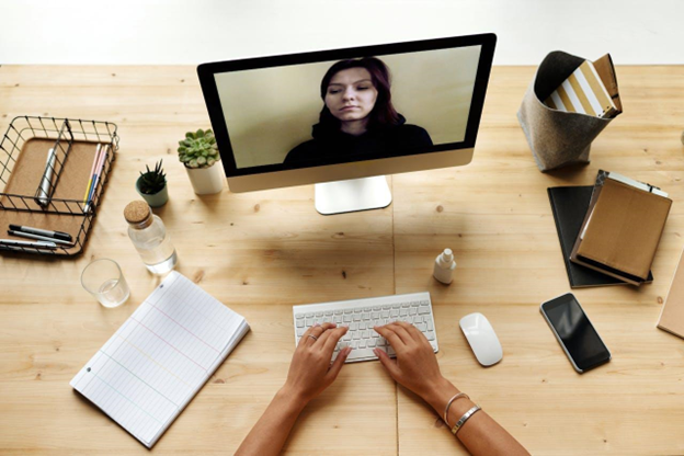Woman on a video call with another person.