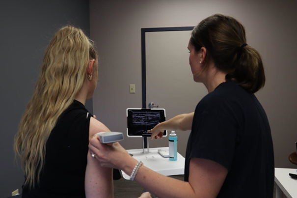 a healthcare professional conducting screening